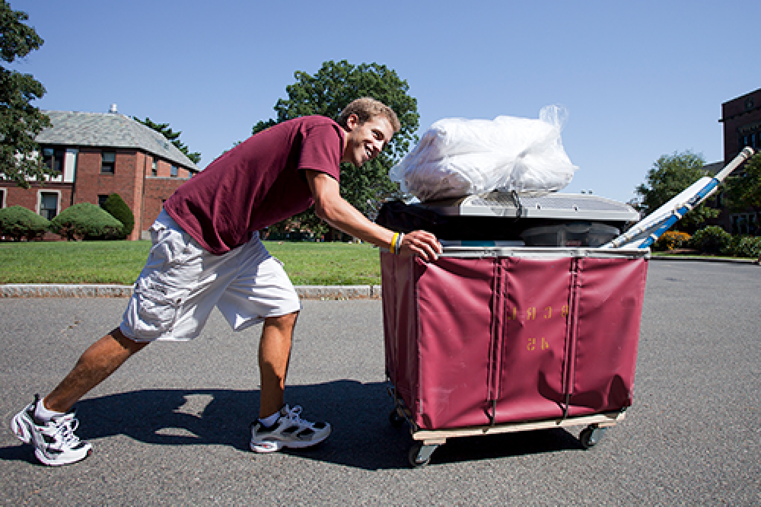 student pushing a cart